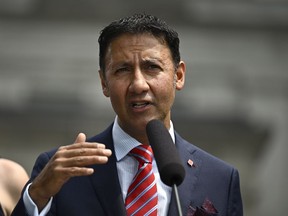 Minister of Justice and Attorney General of Canada Arif Virani speaks during a media availability after a cabinet swearing-in ceremony at Rideau Hall in Ottawa, on Wednesday, July 26, 2023.