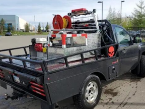 GlobalMedic turns a pickup into a fire truck by placing a fire pump on a skid in the back.