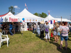 People line up outdoors at the France pavilion