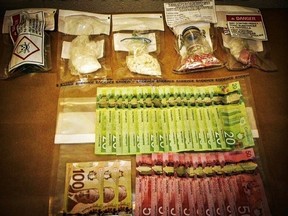 Police seized two scales, aluminum foil and baggies, a cellphone, $1,070 in cash, 3.5 ounces of fentanyl and 4.6 ounces of crystal meth after arresting an Edmonton man they say they found intoxicated in a field in High Prairie July 15.