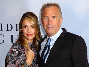 Kevin Costner and Christine Baumgartner are pictured at the Hidden Figures NYC screening in 2016.