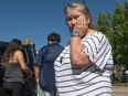 Yvette Bruneau speaks about her harrowing escape through flames and ash from Hay River at an evacuation centre in St. Albert on August 16, 2023. With her was her Son Mason Bruneau and his spouse Tanisha Edison.