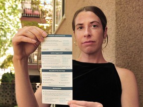 Pivot Legal drug policy lawyer Caitlin Shane holds up a pamphlet that Vancouver police have been tasked to give out to people who are found with small amounts of illicit drugs, instead of seizure of the drugs or their arrest.