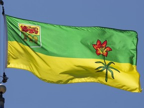 Saskatchewan's provincial flag flies on a flag pole in Ottawa, Monday July 6, 2020. A First Nation in northern Saskatchewan says it has moved about 300 members out of the community to safety in response to health threats arising from forest fire smoke.THE CANADIAN PRESS/Adrian Wyld