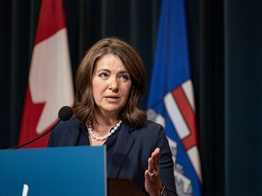 Alberta Premier Danielle Smith speaks at a news conference in McDougall Centre in Calgary on Aug. 14, 2023.