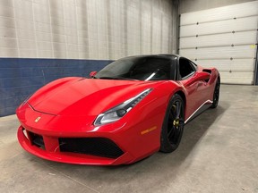 Edmonton police have charged two people after recovering a 2017 Ferrari 488 (pictured) and a 2023 Ferrari F8 Tribute stolen from Ontario earlier this year and re-registered in Alberta.