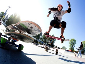 A competitor takes part in a high ollie contest during the Tigers Skate Club's Ambush event at the St. Albert skatepark, Saturday Sept. 9, 2023. The Ambush is an all-women, girls and/or trans, non-binary, or gender expansive skateboarding event. Photo by David Bloom