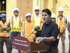 Prime Minister Justin Trudeau visits the construction site of an affordable housing project in London, Ont. on Wednesday, September 13, 2023.