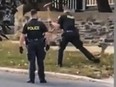 Framegrab of a video that captured an OPP Kenora officer trying to euthanize an injured deer. An investigation is underway.