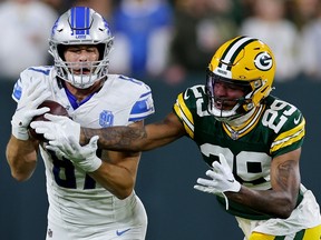 Sam LaPorta of the Detroit Lions makes a catch against Rasul Douglas of the Green Bay Packers at Lambeau Field on September 28, 2023 in Green Bay, Wisconsin.