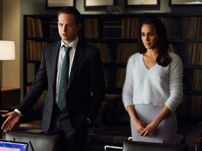 Patrick J. Adams as Mike Ross and Meghan Markle as Rachel Zane on Suits.