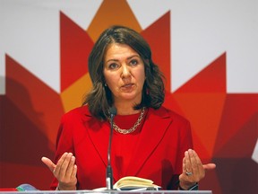 Premier Danielle Smith speaks to the media during the 24th World Petroleum Congress in Calgary on Monday, September 18, 2023.