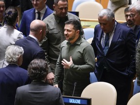Ukrainian President Volodymyr Zelenskyy is set to visit Ottawa this week following his appearance at the United Nations General Assembly. Zelenskyy, centre, greets people before the start of the 78th session of the United Nations General Assembly at United Nations headquarters, Tuesday, Sept. 19, 2023.