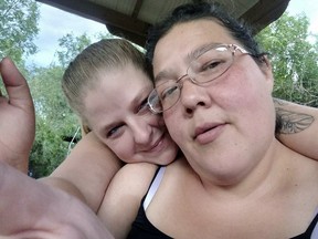 This selfie photo provided by Trevala Jara shows Trevala Jara, left, and Christine Vance posing for a photo together in July 2022 in Colorado.