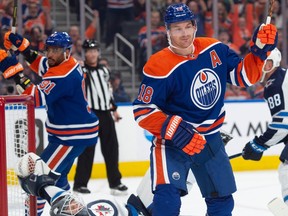Zach Hyman (18) of the Edmonton Oilers celebrates his first period goal against the Winnipeg Jets at Rogers Place in pre-season NHL action in Edmonton on Sunday, Sept 24, 2023.