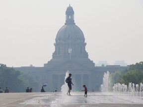 Wildfire smoke rolled into Edmonton reducing visibility and had a negative impact on air quality. The Alberta Legislature building is obscured by smoke from only a block away in the Violet King Henry Plaza on Saturday, Sept. 2, 2023.