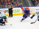 Edmonton Oilers Connor McDavid (97) shoots the puck past Vancouver Canucks goalie Casey DeSmith (29) during first period NHL preseason action on Wednesday, Sept. 27, 2023 in Edmonton. 