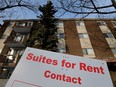 A suites for rent sign outside an apartment building in Edmonton, Monday Jan. 30, 2023.