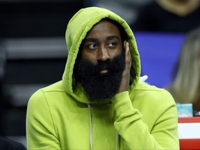 James Harden #1 of the Philadelphia 76ers looks on during the first quarter against the Portland Trail Blazers at Wells Fargo Center on October 29, 2023 in Philadelphia.