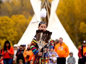 Jingle Dress Dancer Luna Kingfisher, 10, performs during Truth and Reconciliation Day ceremonies in Edmonton's Kinsmen Park, Saturday Sept. 30, 2023. Photo by David Bloom