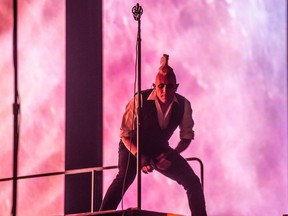 Tool are on a with a six-week, North American tour that brought them to Rogers Place in Edmonton on Oct. 25, 2023. Singer Maynard James Keenan, bassist Justin Chancellor and drummer Danny Carey. Photo by Shaughn Butts-Postmedia