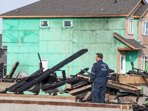 An overnight fire destroyed two duplex buildings in southeast Edmonton near 30 Ave. and 4 Street on Oct. 10, 2023.