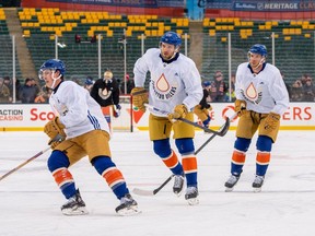Ryan Nugent-Hopkins (93) ,Leon Draisaitl (29) and Connor McDavid (97) skate at the Edmonton Oilers practice at Commonwealth Stadium in preparation for tomorrows outdoor Heritage Classic game against the Calgary Flames. Taken on Saturday, Oct. 28, 2023 in Edmonton. Greg Southam-Postmedia