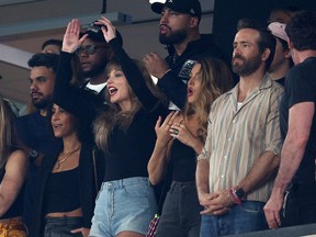 Left to right: Taylor Swift, Blake Lively and Ryan Reynolds cheer prior to the game between the Kansas City Chiefs and the New York Jets at MetLife Stadium on Oct. 1, 2023 in East Rutherford, N.J.