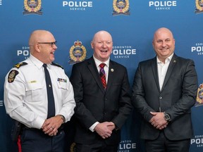 Chief Dale McFee,Edmonton Police Service, Scott Maxwell, Executive Director, Wounded Warriors Canada and Curtis Hoople, President, Edmonton Police Association pose for a photo after The Edmonton Police Service announce the EPS' partnership with Wounded Warriors Canada on Tuesday, Oct. 24, 2023 in Edmonton. Greg Southam-Postmedia