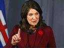 Premier Danielle Smith speaks to media at the UCP annual general meeting in Calgary on Saturday, Nov. 4.