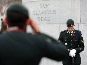 Corporal Heichert stands Honour Guard at the cenotaph