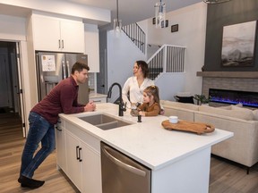 The new community of Riverside in St. Albert is where Eric Van Lochem, Isabelle Poirier and their daughter, Charlotte, 4, immediately felt at home.