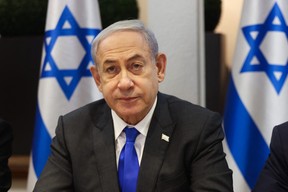 Israeli Prime Minister Benjamin Netanyahu chairs a Cabinet meeting at the Kirya, which houses the Israeli Ministry of Defence, in Tel Aviv on Sunday, Dec. 17, 2023.