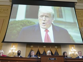 A video of former President Donald Trump speaking on Jan. 6, 2021, plays as the House select committee investigating the Jan. 6 attack on the U.S. Capitol holds a hearing at the Capitol in Washington, July 21, 2022.