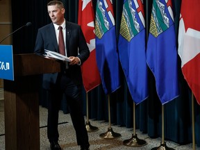 Alberta Finance Minister Nate Horner arrives to speak to the media at a news conference in Calgary, Thursday, June 29, 2023. Albertans will have to wait until the fall before they learn what the federal government thinks they should get if the province quits the Canada Pension Plan.