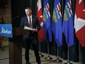 Alberta Finance Minister Nate Horner arrives to speak to the media at a news conference in Calgary, Thursday, June 29, 2023. Alberta's budget for 2024-25 foresees a slim $367-million surplus, with slightly lower revenues compared to last year's estimated top line.