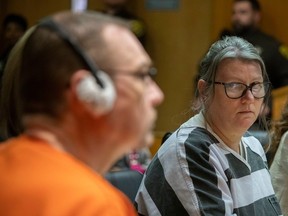 Jennifer Crumbley looks at husband James Crumbley during their sentencing on four counts of involuntary manslaughter for the deaths of four Oxford High School students by their son, mass school shooter Ethan Crumbley, on April 9, 2024, at Oakland County Circuit Court in Pontiac, Mich.