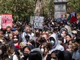 New York University (NYU) students and faculty participate in a protest against Israel's war in Gaza at Washington Square Park on April 23, 2024 in New York City. NYU students have joined a growing number of students at colleges around the country calling for a ceasefire in Gaza and for their schools to divest from Israel.