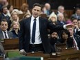 Conservative Leader Pierre Poilievre rises in response to the Speaker of the House of Commons during question period, Tuesday, April 30, 2024, in Ottawa.