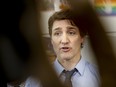 Prime Minister Justin Trudeau responds to media as he announces a school food program at Elwick Community School in Winnipeg, Friday, May 17, 2024.
