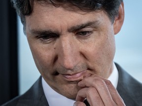 Prime Minister Justin Trudeau listens during a news conference in Vancouver, Tuesday, June 25, 2024.