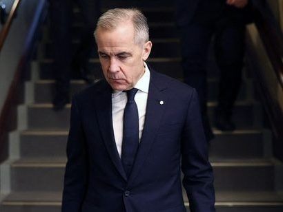 Prime Minister Mark Carney makes his way to the National Caucus meeting on Parliament Hill February 11, 2026 in Ottawa, Canada.