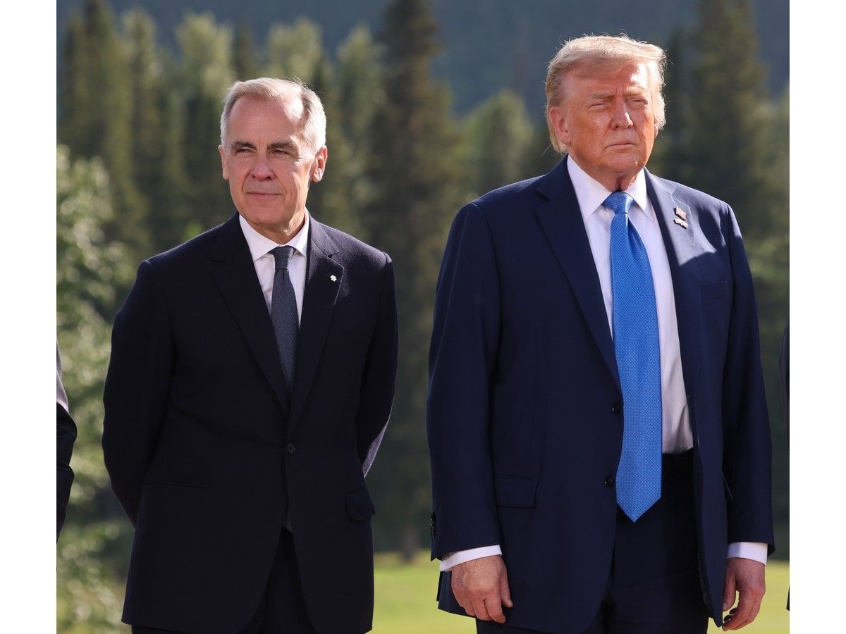 Prime Minister Mark Carney, left, and U.S. President Donald Trump are pictured together in this file photo. Trade tensions between Canada and the United States continue to escalate.