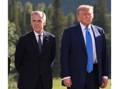 Prime Minister Mark Carney, left, and U.S. President Donald Trump are pictured together in this file photo. Trade tensions between Canada and the United States continue to escalate.