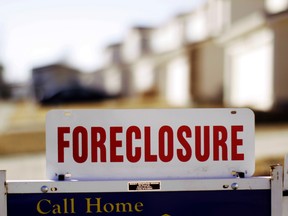 Foreclosure sign in front of a house in Denver, Colorado March 4, 2009