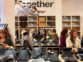 Shoppers inside the Gap store in SoHo on Broadway in Manhattan