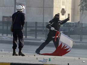 Bahraini police fire teargas and rubber bullets to break up pro-democracy protests in 2011 in Shi'ite villages near the capital, Manama.