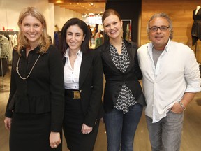 Danielle Traub, President of Young Women in Law, Carolyn Berger, Managing Director of event sponsor Marsden Group, Jill Uanderzano, Supervisor at TNT Hazelton Lanes and Arie Assaraf, owner of Hazelton Lanes, pose for a photo before the YWL "Dress to Impress" event.