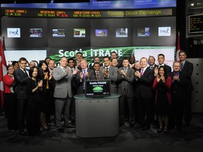 Scotia iTRADE and Claymore Investments open the TSX Thursday morning to celebrate their deal to offer commission-less ETFs on most Claymore ETFs and a handful of iShares and Horizons Betapro products.