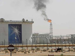 A gas flame is seen in the desert near an Aramco oilfield, about 160-kilometres from Riyadh.